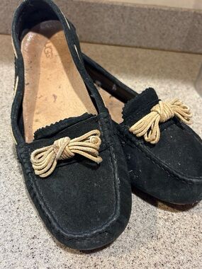 UGG Black Suede Slip-On Moccasin with Tan Trim